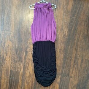 Tight sleeveless, high neck purple and black dress